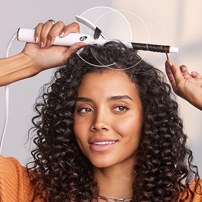 How to use curling iron on curly hair best sale