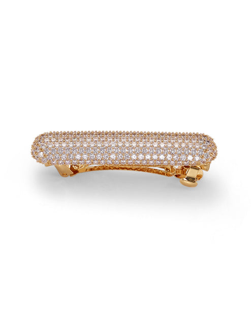 A gold and crystal barrette