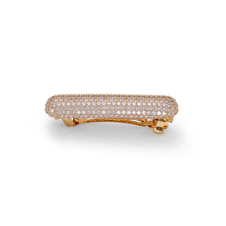 A gold and crystal barrette