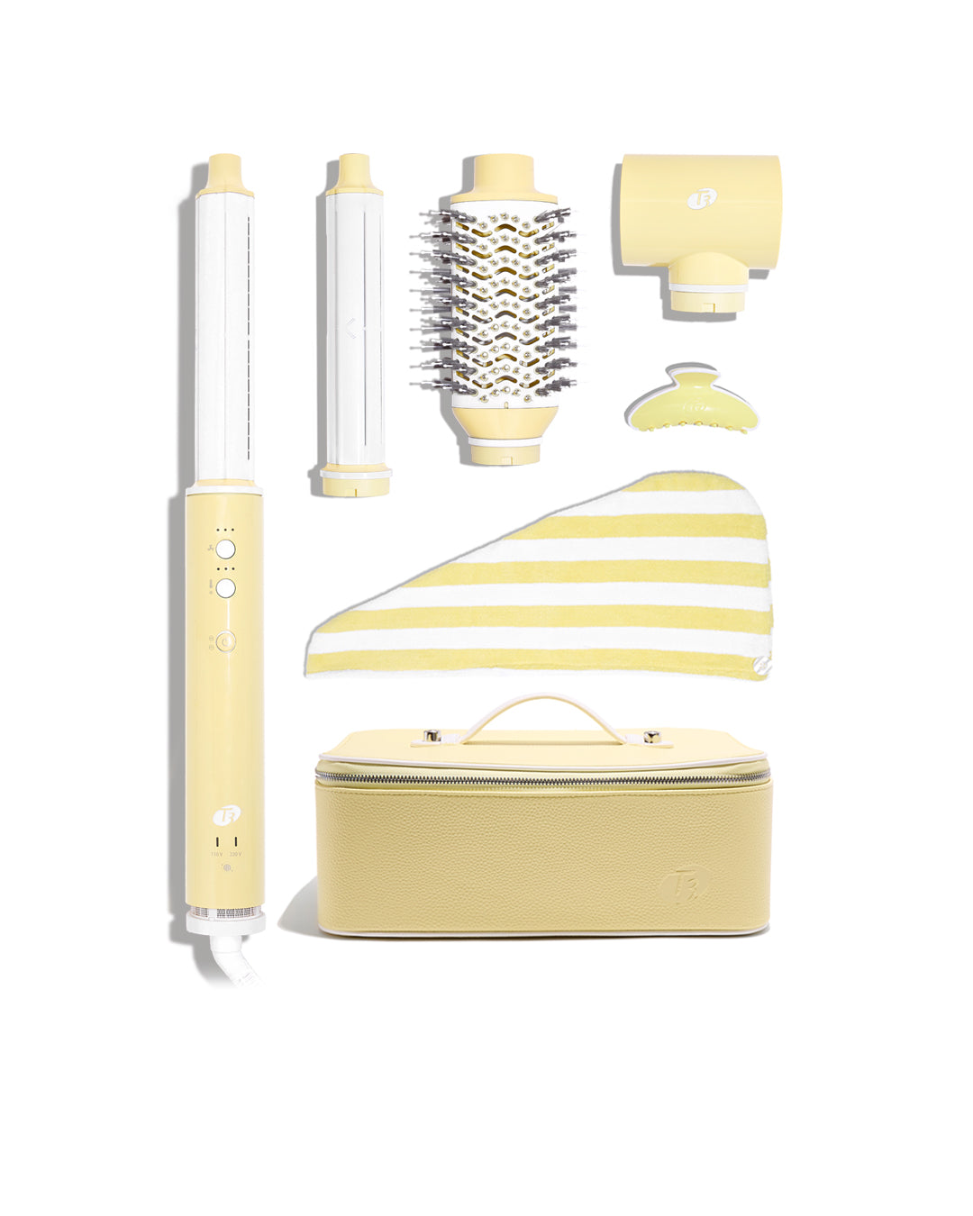 Yellow hair styling tool set with multiple attachments on a white background