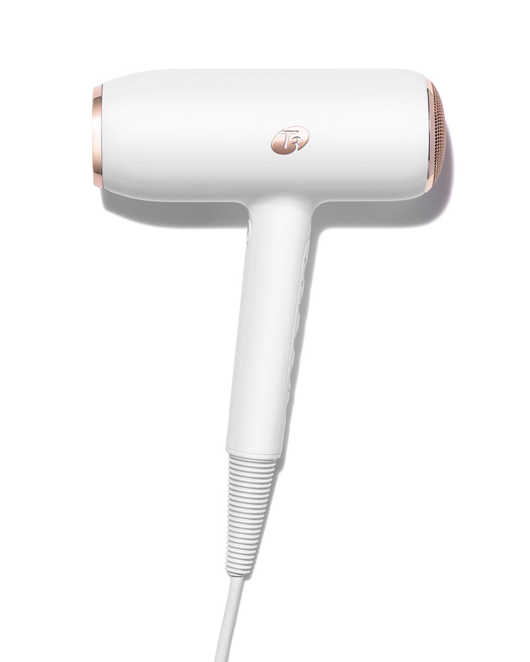 White and rose gold hair dryer on a white background