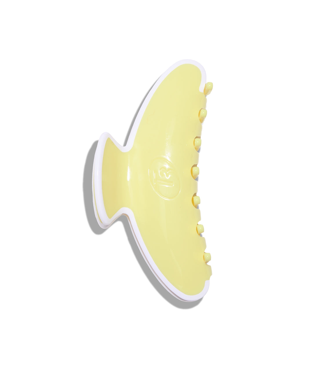 Yellow shoe with white sole on a white background